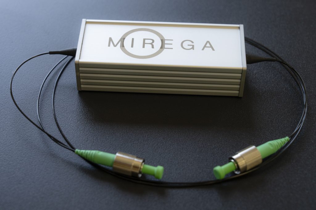 Mirega fiber Fabry-Perot tunable optical filter: a compact ridged housing with two fiber pigtails terminated in green FC/APC connectors.